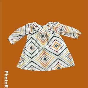 Diamond pattern, long sleeve baby girl dress.